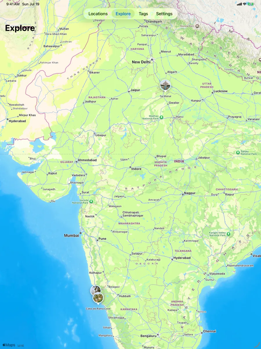 Waypoint: Location Snapshot — iPad — full-width Explore map with photo pins and the floating nav bar.